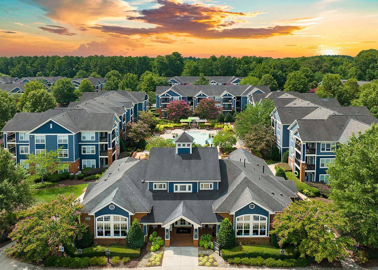 an aerial view of a neighborhood with houses and trees