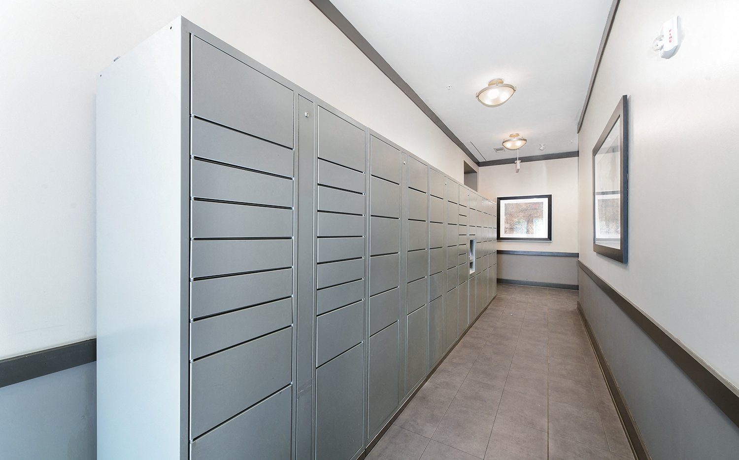 a row of lockers in a hallway of a building