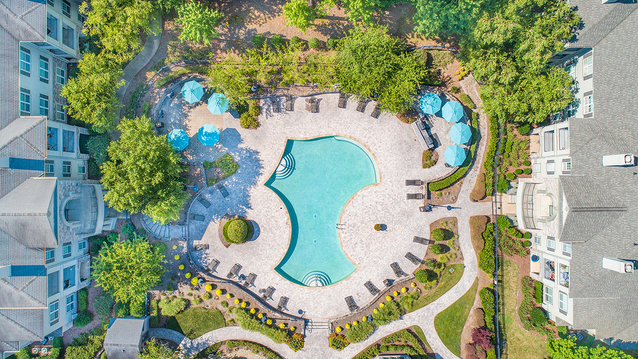 an aerial view of the pool at the resort at longboat key club
