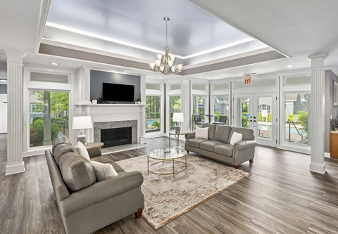 A living room with a fireplace and a couch.
