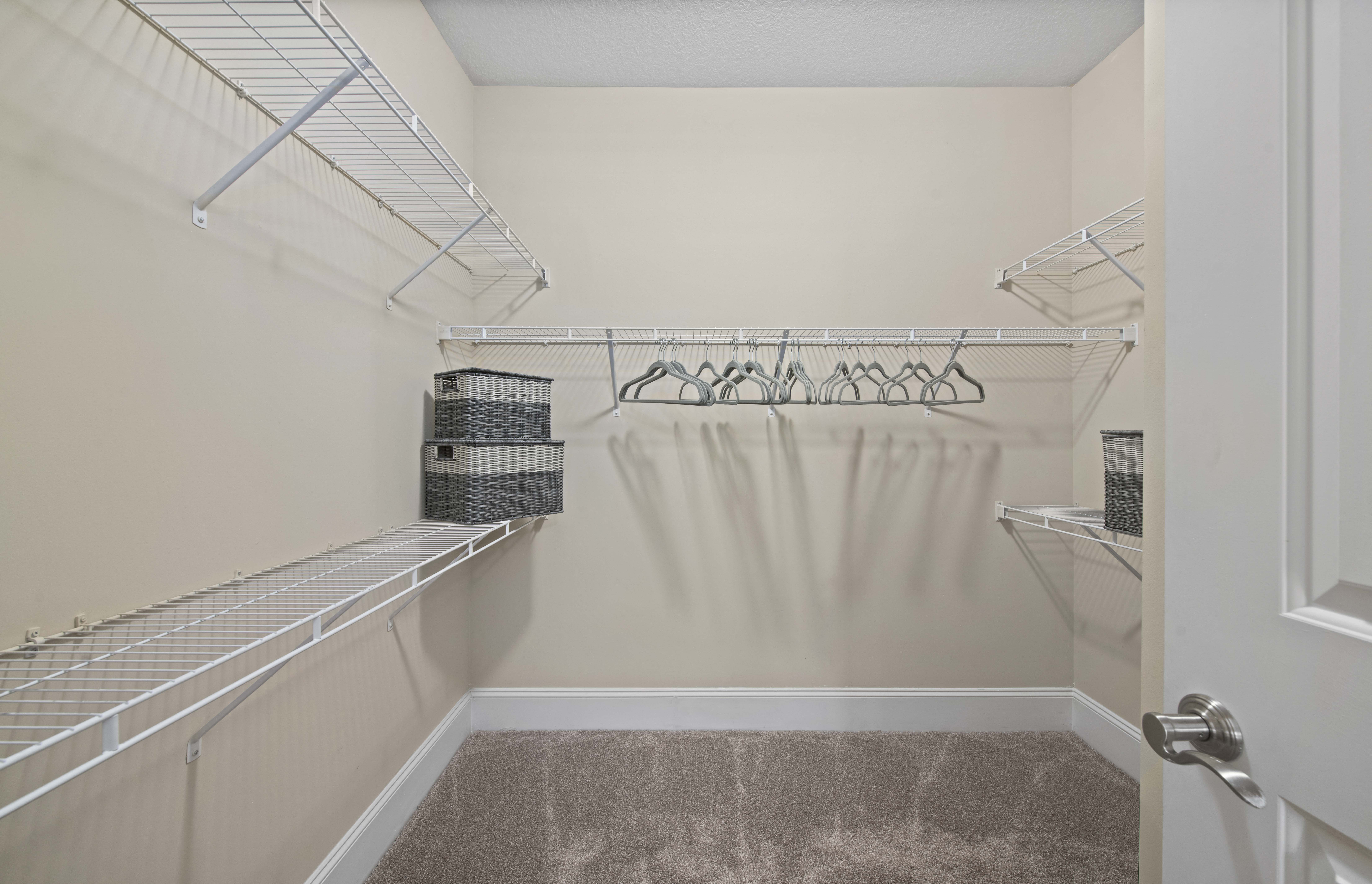 our spacious closets are equipped with shelves and hooks for clothes and baskets