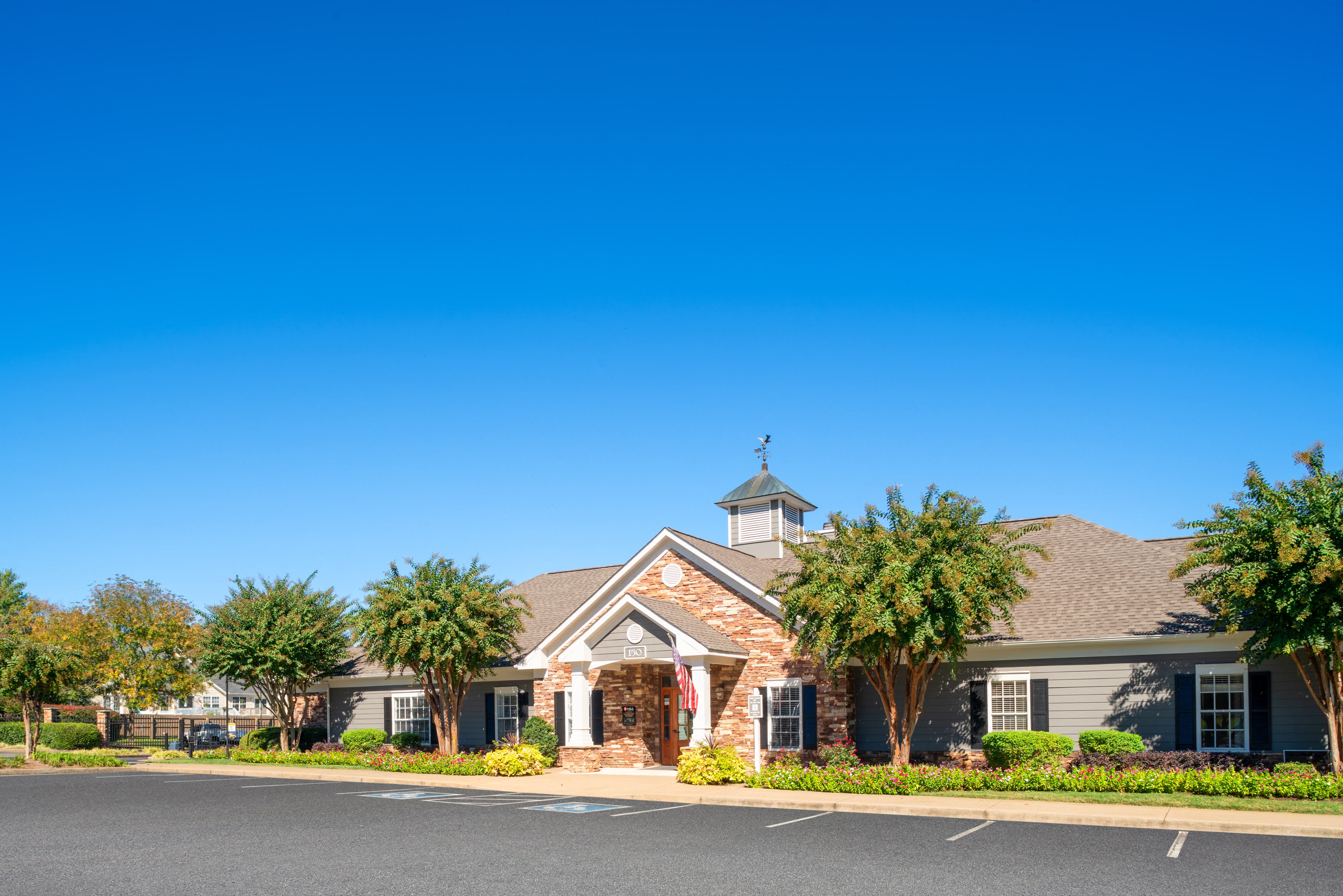a house with palm trees in front of it