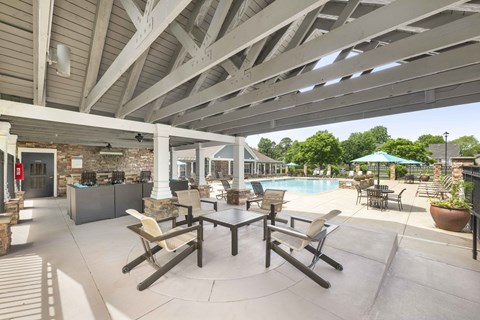 A patio with a table and chairs is shown.