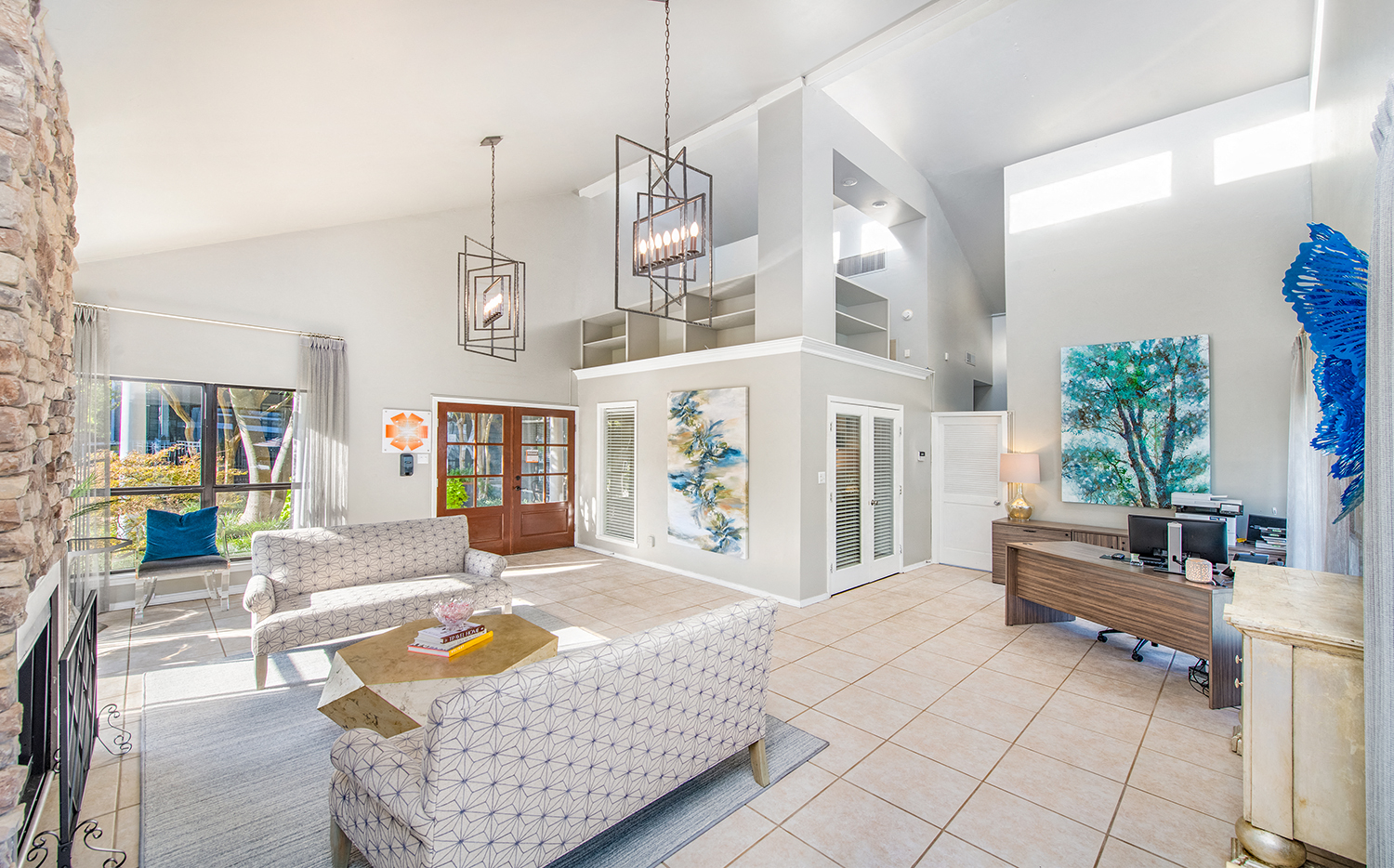 a living room with two couches and a coffee table