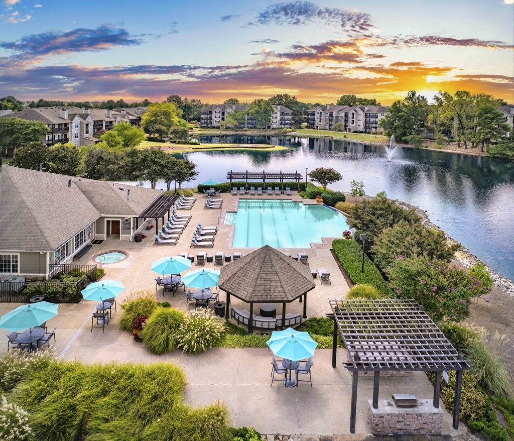 an aerial view of the pool at the resort on the water
