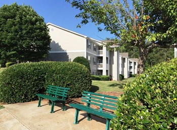 Benches and apartment building exterior