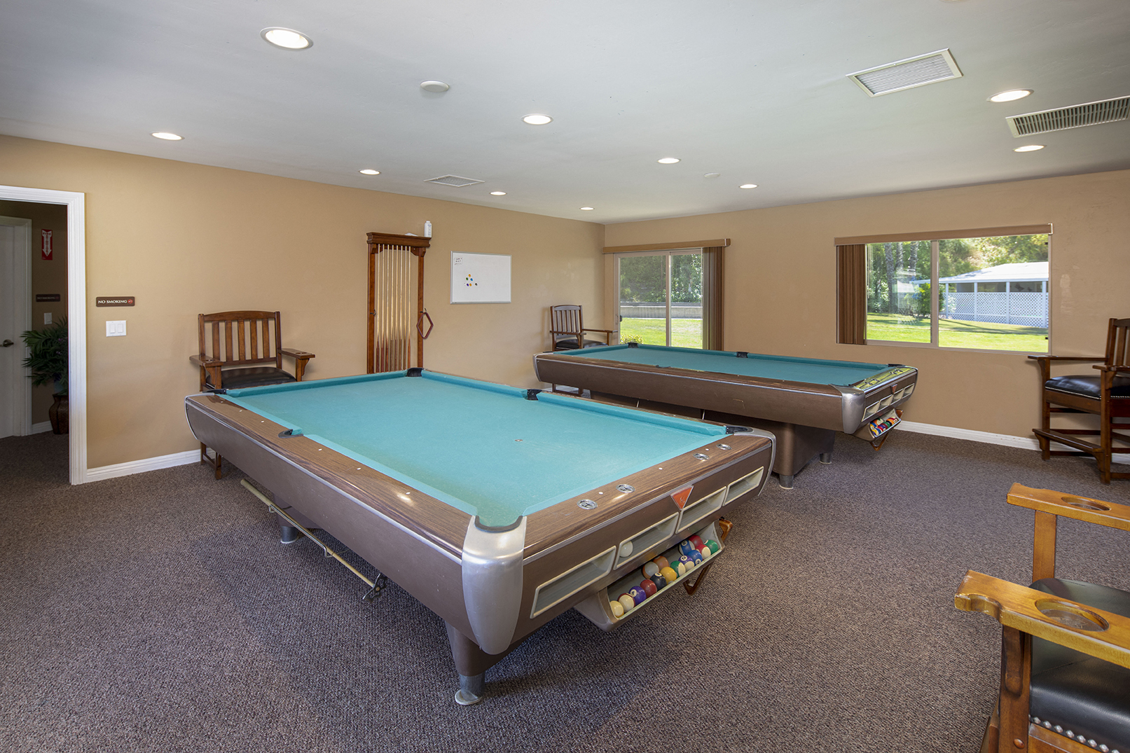 Far View of community clubhouse pool tables
