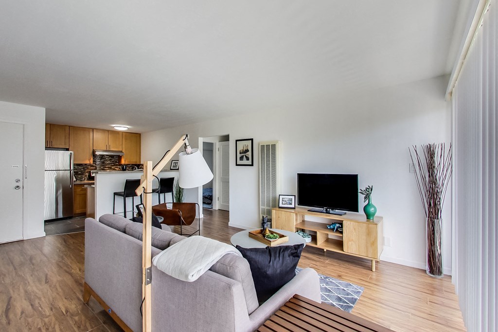 a living room with a couch and a tv