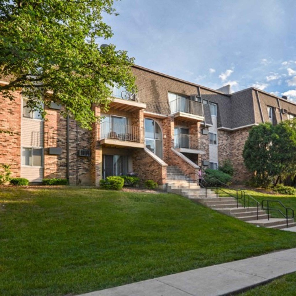 our apartments are located in a quiet neighborhood with lush green grass