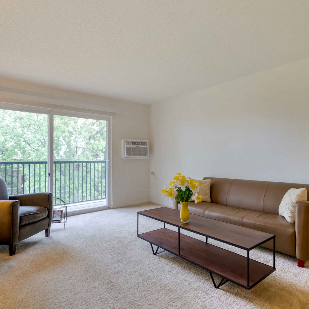 a living room with a couch and a coffee table