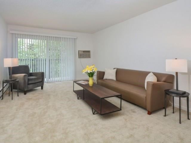 a living room with a couch and a table