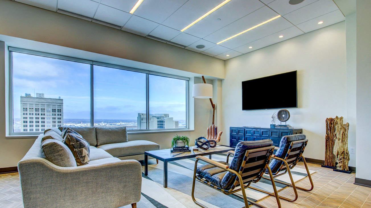 living room looking out over a city at The Grand, Kansas City, 64106