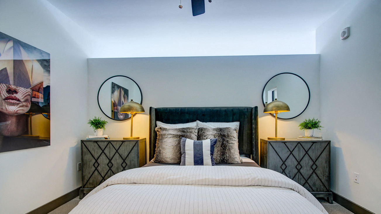 bedroom with two site tables  at The Grand, Missouri, 64106
