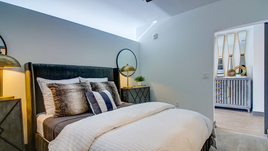 bed in a bedroom  at The Grand, Kansas City, Missouri