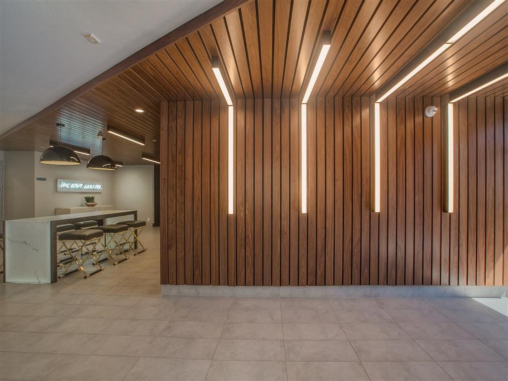 a large room with a table and chairs in it