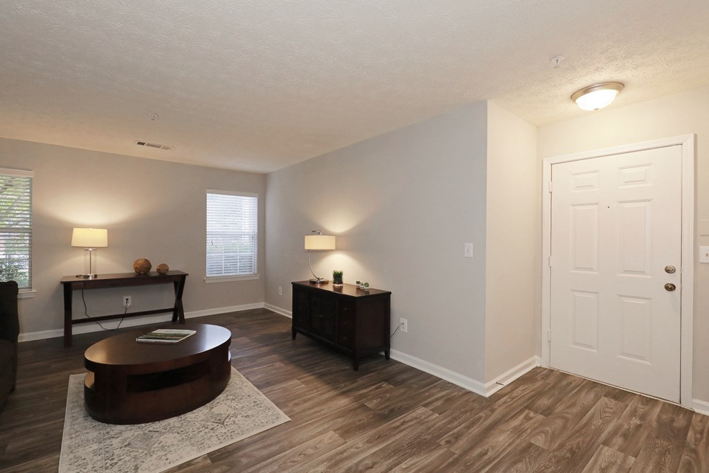 a living room with a couch and a table