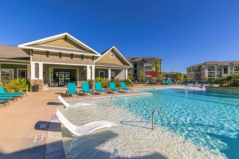 the swimming pool at the preserve at polo ridge apartments