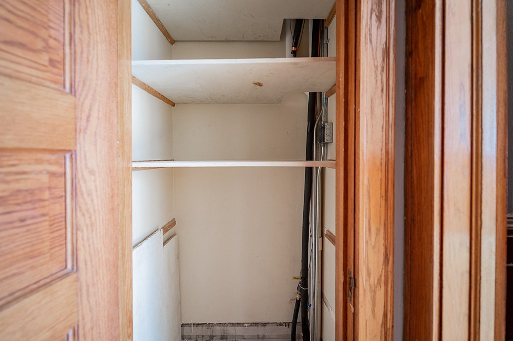the closet in the laundry room is being remodeled