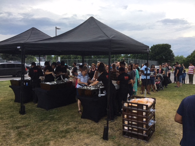 The 13th Annual BBQ at 2560 Kingston Rd. Lots of food for all!