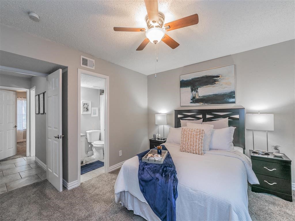 Contemporary bathroom with large mirror and modern lighting