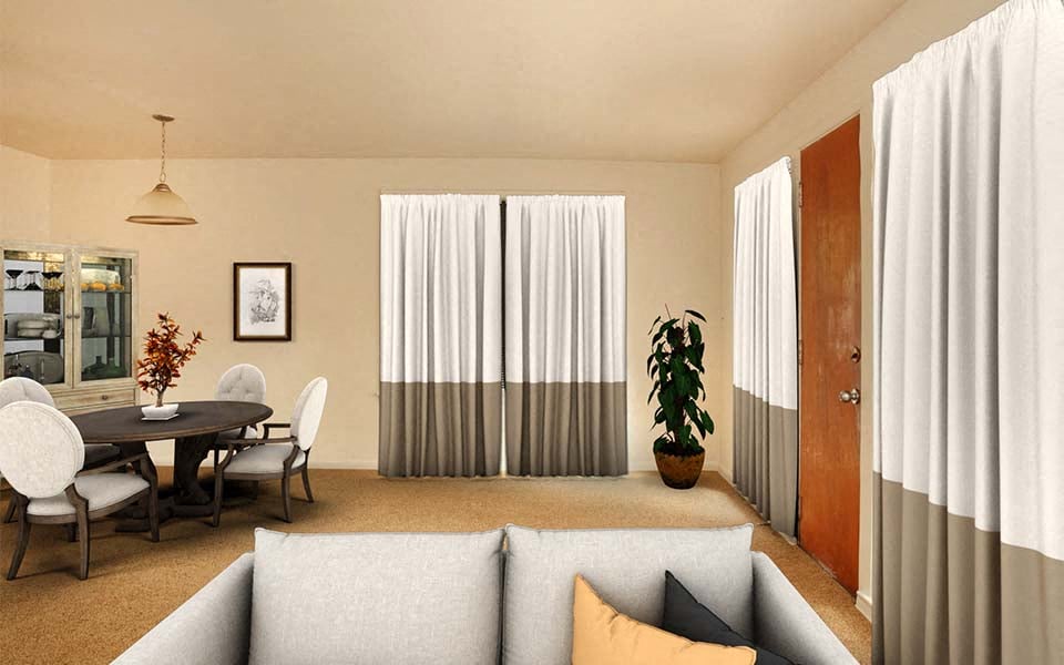 a living room with a table and a couch