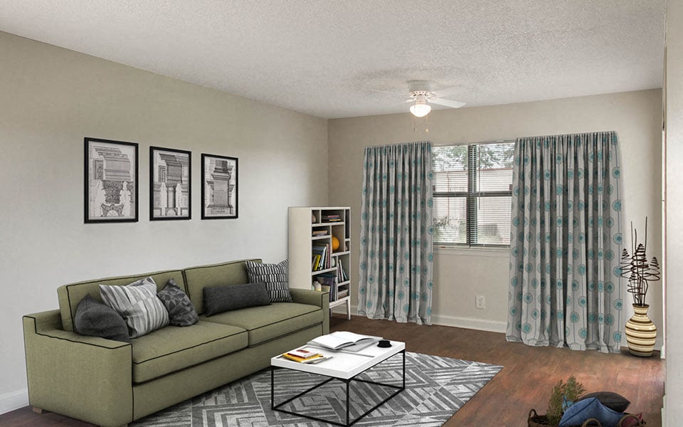 a living room with a couch and a coffee table