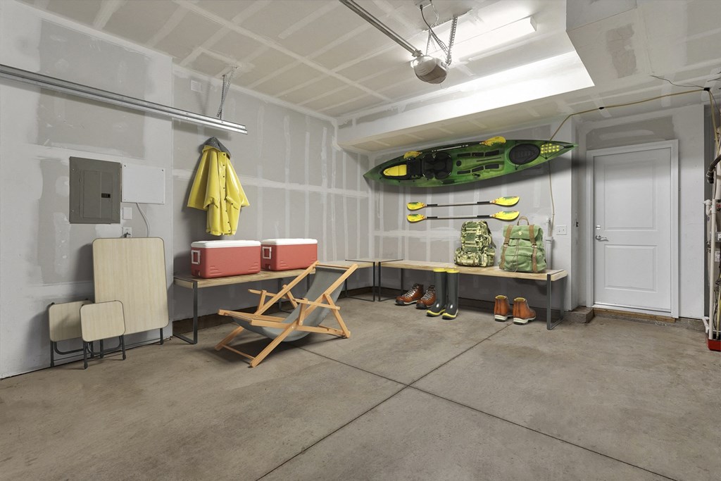 a room filled with furniture and a surfboard on the wall