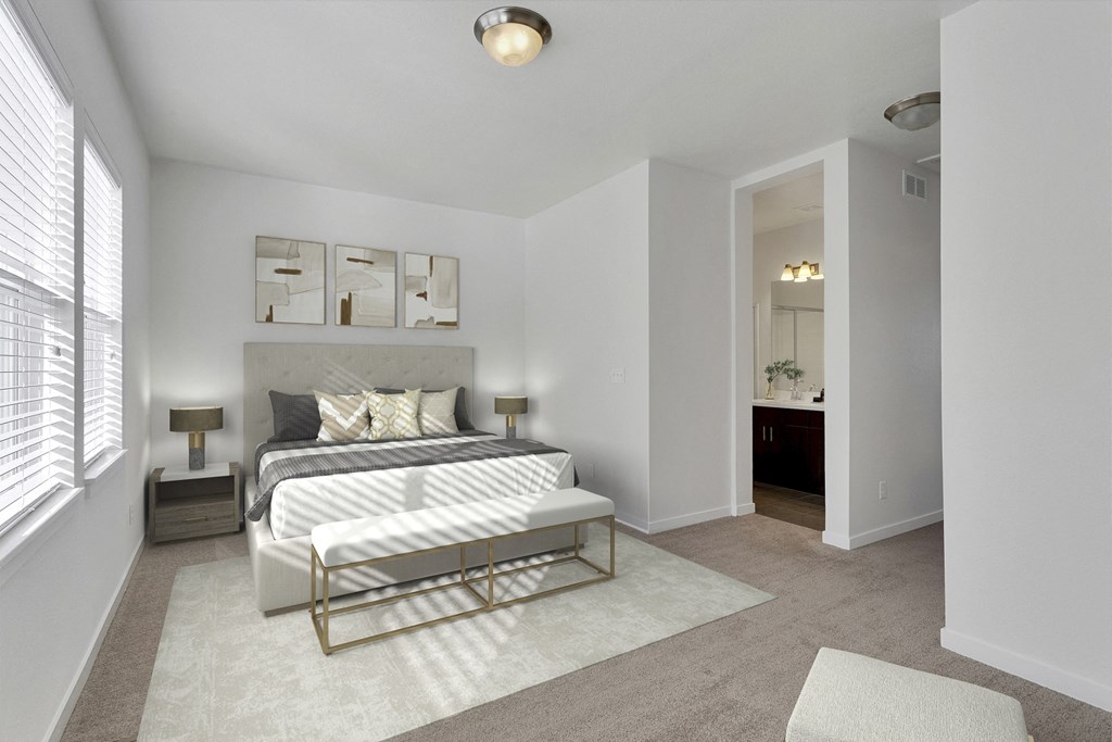 a bedroom with a bed and a mirror in a house