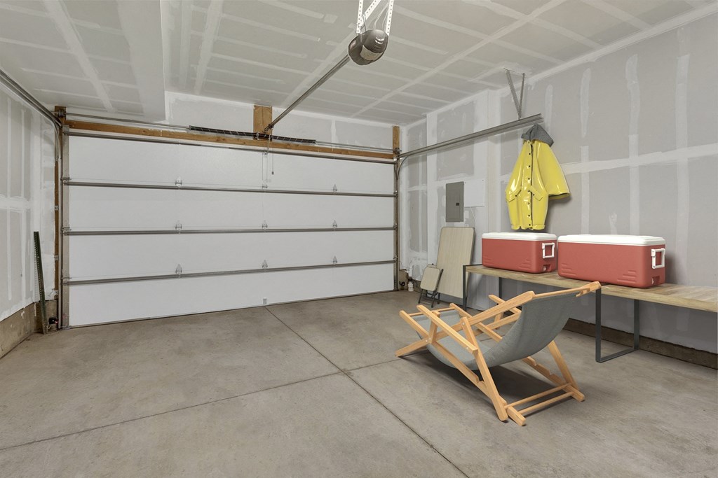 a room with a chair and a garage door