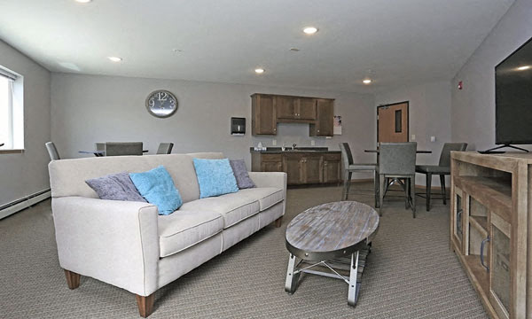 a living room with a couch and a table