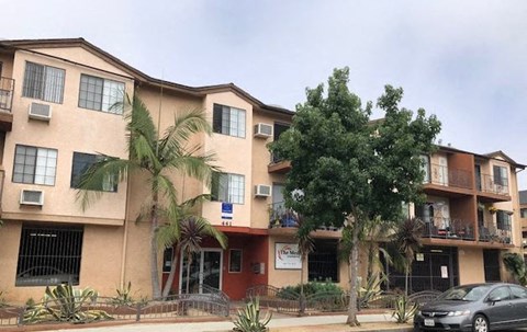 a building with a car parked outside of it