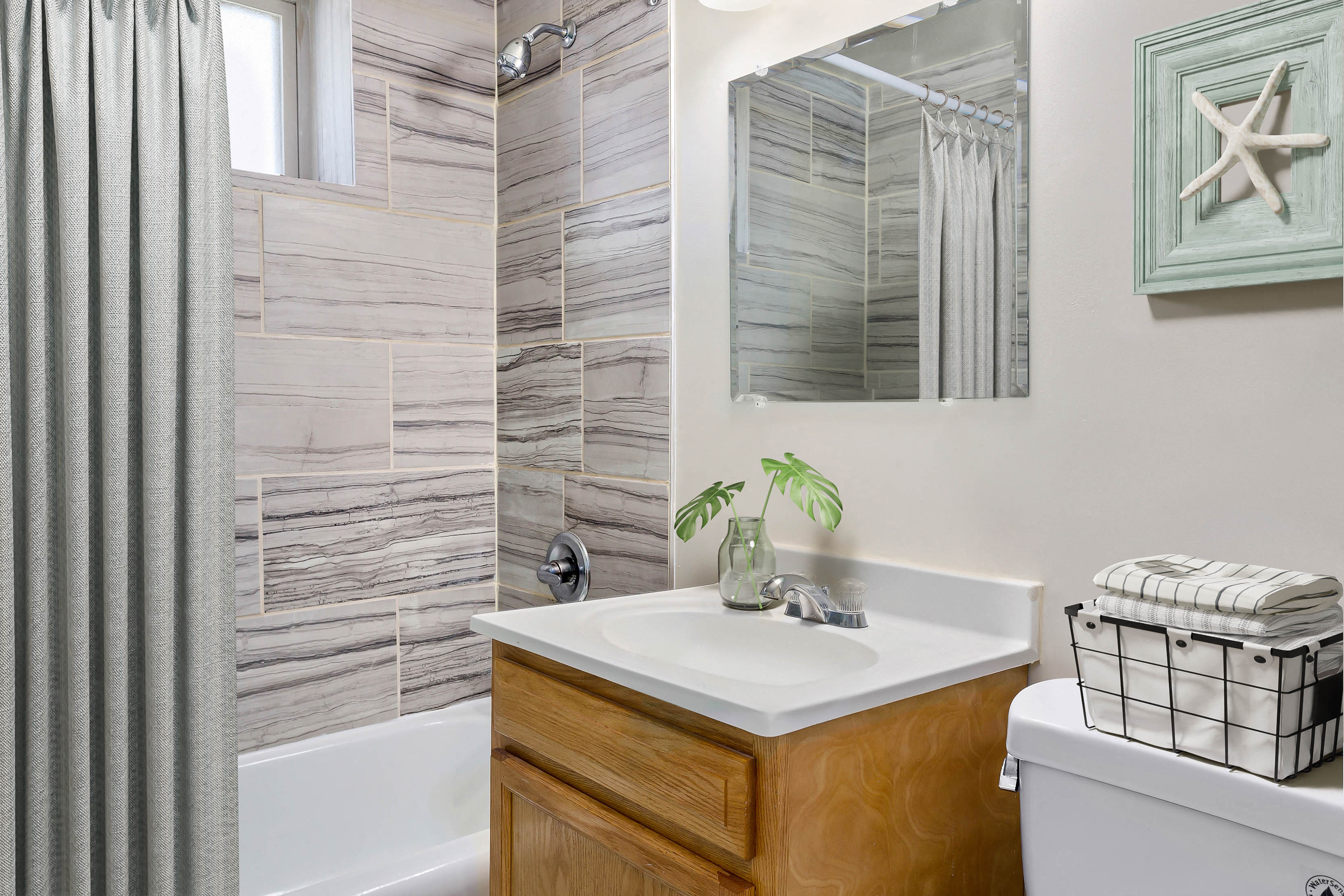 The Dona bathroom tiled tub