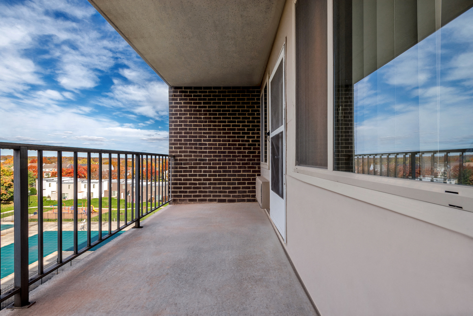 Middletowne private balcony overlooking pool