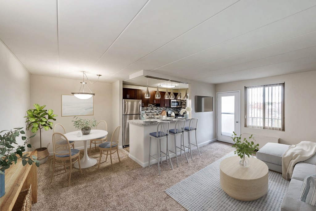 a living room with a kitchen and a dining room