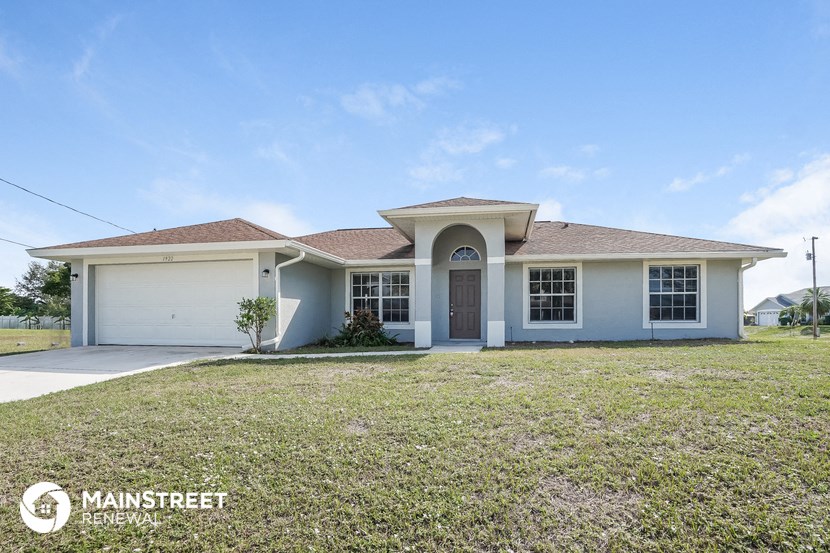 a house with a lawn in front of it