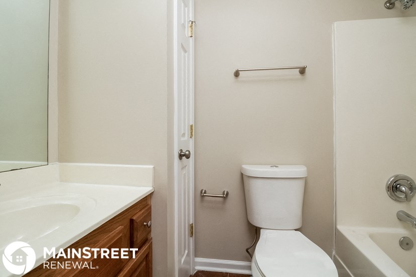 a small bathroom with a toilet and a sink