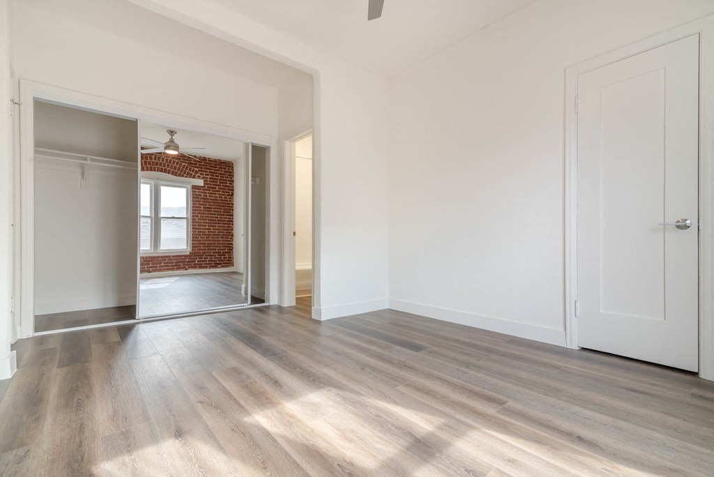 Brick wall and window view with mirri closets