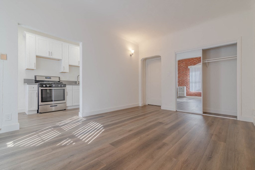Kitchen and front entrance view from living area