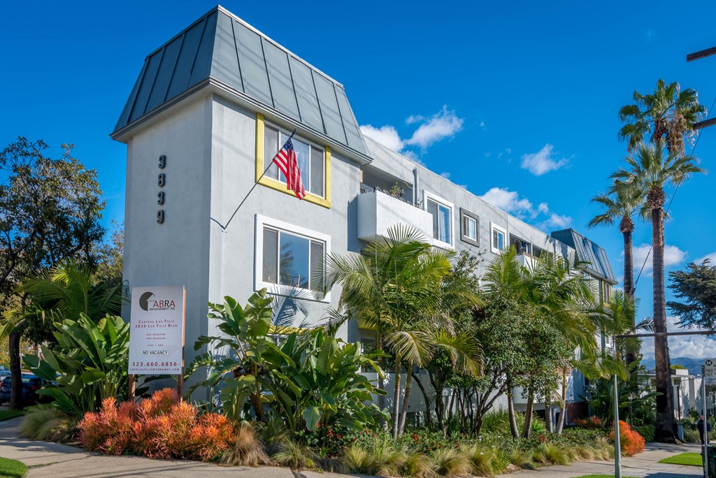 front of building with lush landscaping