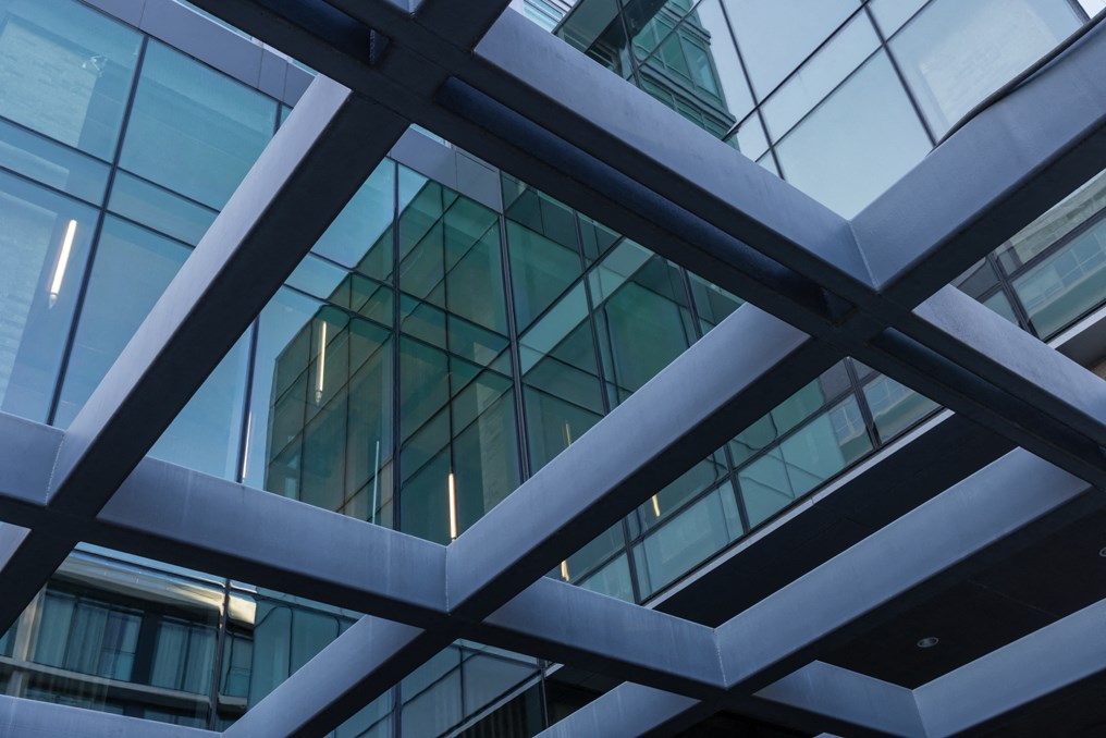a close up of a building with glass windows