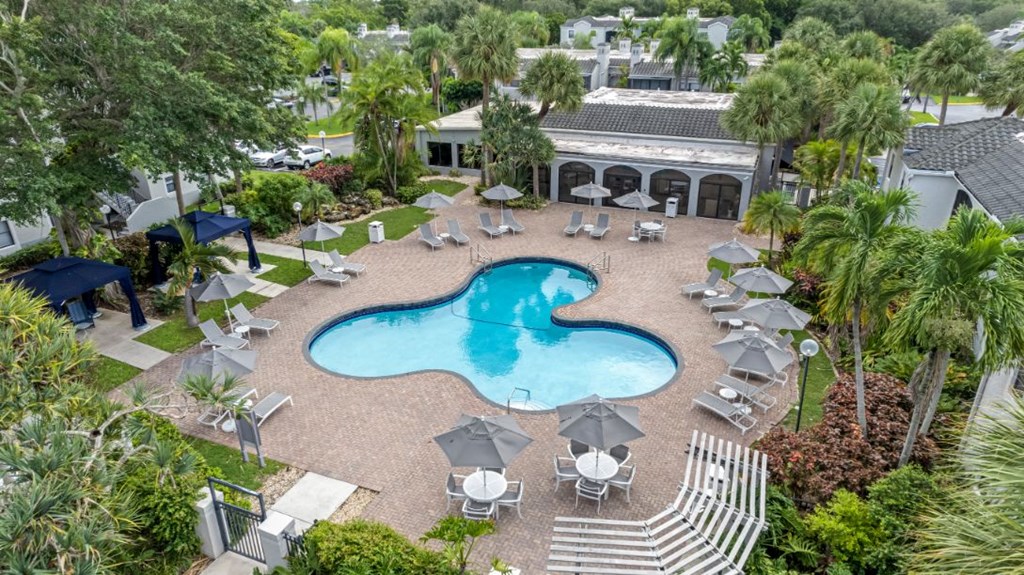 an aerial view of the pool at the resort at longboat key club