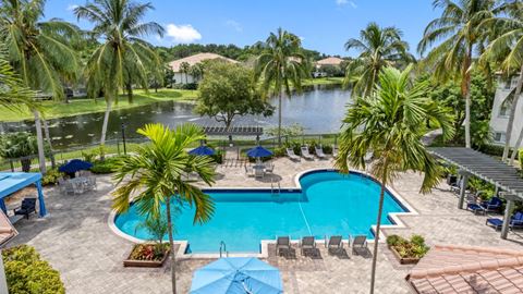 a view of the pool at the resort at longboat key club