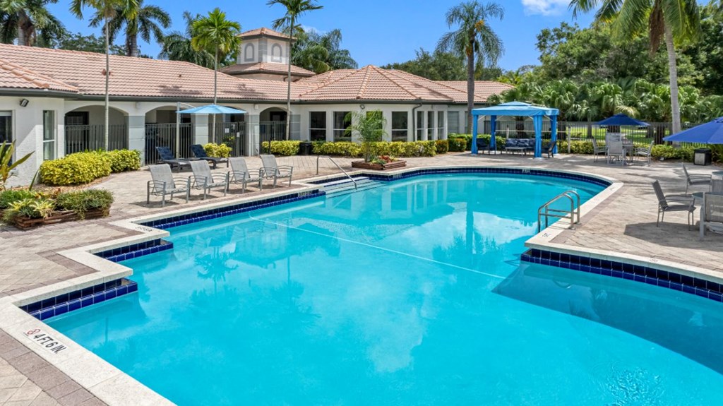 the swimming pool at the resort on a sunny day