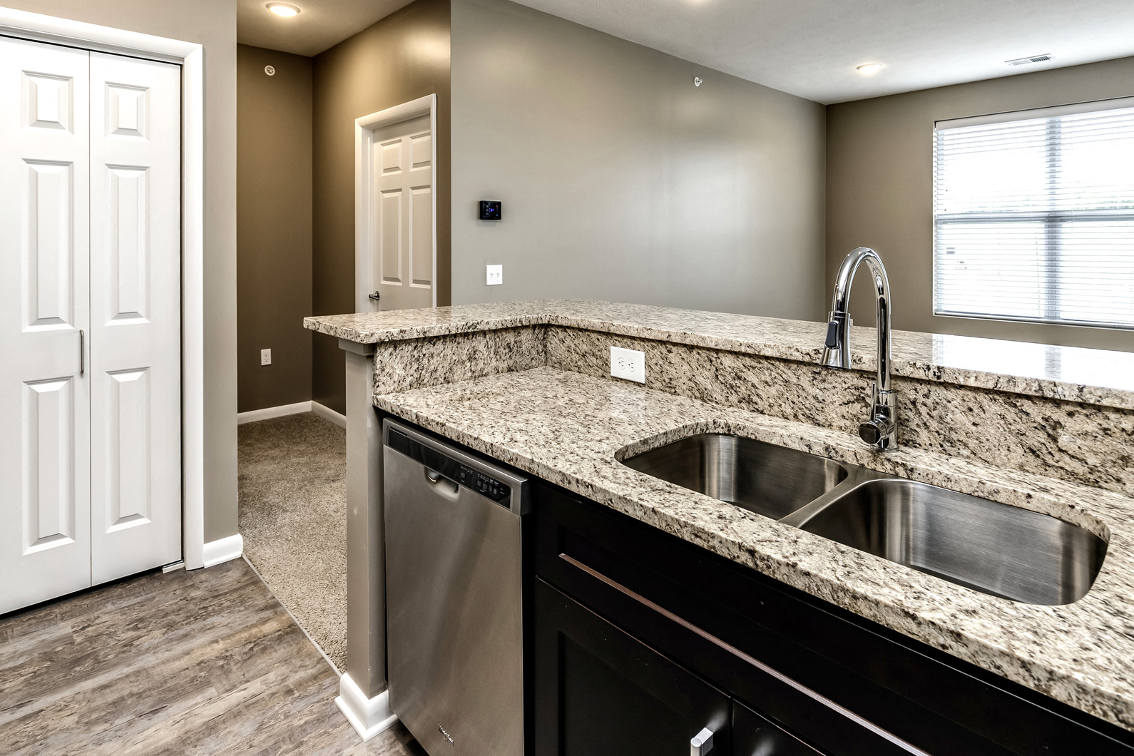 Large kitchen island at The Apartments at Lux 96 in Papillion, NE