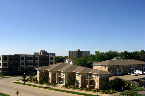 a building with a street in front of it and some buildings