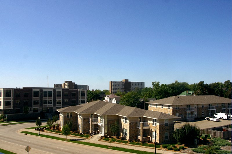 a building with a street in front of it and some buildings