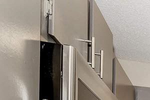 a kitchen with stainless steel appliances and granite counter tops