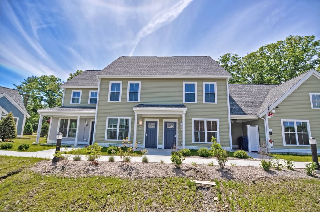 a house with a front yard and a driveway