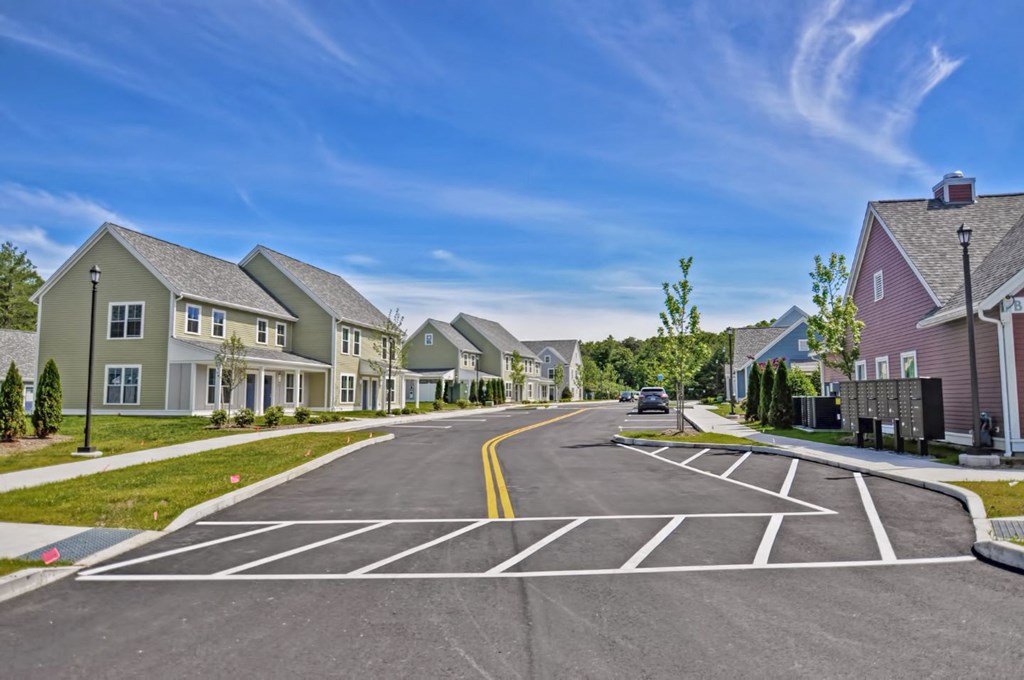 a street with houses on the side of a road