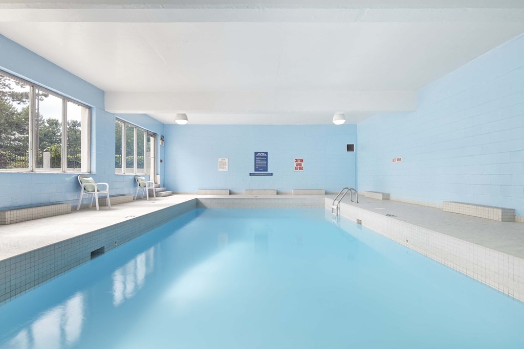 the pool in our indoor heated pool house at our apartments